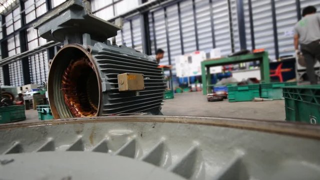 Activity of technician to working repair and fix induction motor in maintenance work shop 