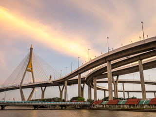 Obraz na płótnie Canvas Industrial ring bridges in Bangkok under twilight sky