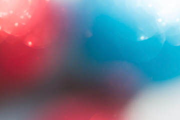 red and blue background, abstract bokeh light celebration blur