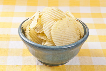 tasty potato chips in bowl