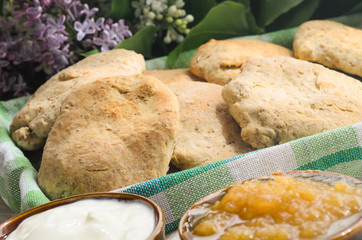 breakfast with buns, jam and  cottage cheese