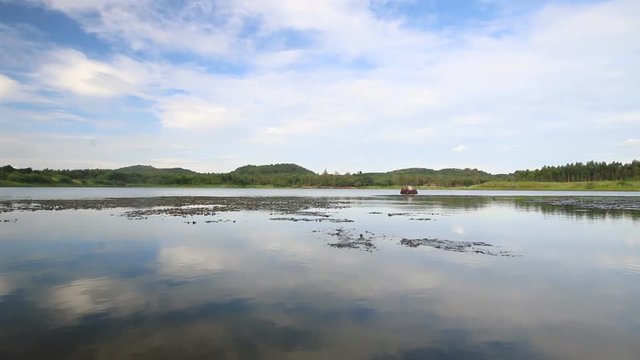 Video panning of Landscape scene of nature lake with blue sky , Eastern of Thailand 