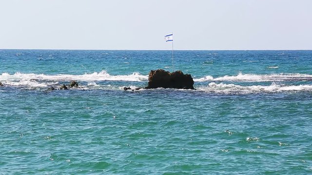 Israeli flag on Andromeda's Rock in Jaffa city, Israel