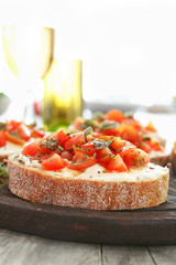 Sandwich with tomatoes, goat cheese and basil
