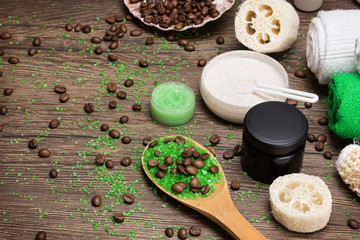 Anti-cellulite cosmetics with caffeine on wooden surface