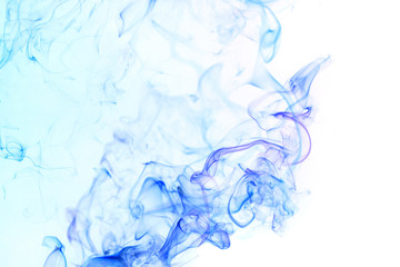 Fototapeta na wymiar Abstract blue smoke from aromatic sticks.