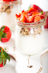 Strawberries desert with cream and cereals