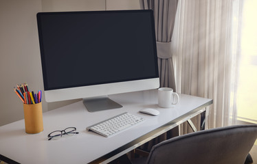 Blank computer desktop with keyboard, diary and other accesories