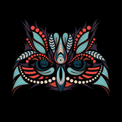 Patterned colored head of the owl. African / indian / totem / tattoo design. It may be used for design of a t-shirt, bag, postcard and poster.