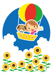 夏　気球で空の旅を楽しむワンちゃんと女性