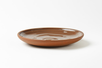 Round brown dinner plate