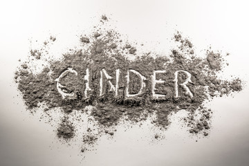 Cinder word written in ash, sand, dust