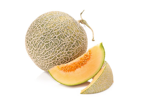 cantaloupe melon slices isolated on white background