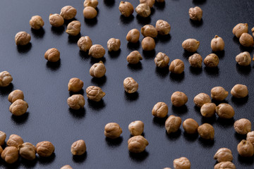chickpeas on a black table