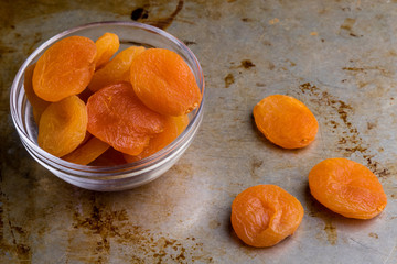 dried peach on steel plate