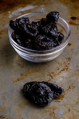prunes on steel plate