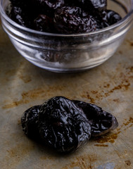prunes on steel plate