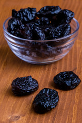 prunes on wooden table