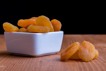 dried peach on wooden table