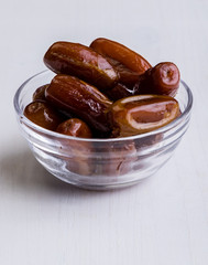 dried dates on white table