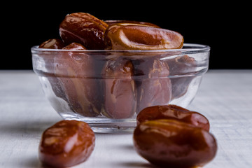 dried dates on white table