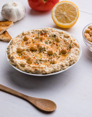 hummus on white table