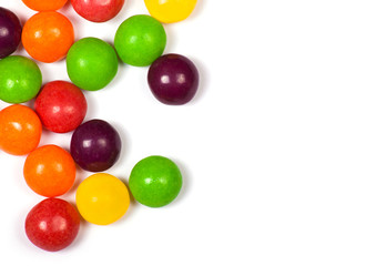 Multicolored candy on a white background.