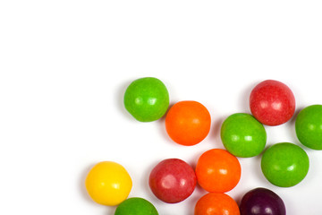 Multicolored candy on a white background.
