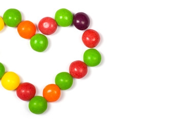 Multicolored candy on a white background.