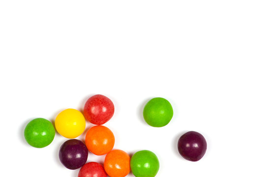 Multicolored candy on a white background.