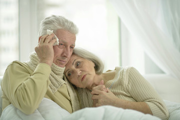  sick  elderly couple in bed