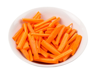 Carrots to a plate on