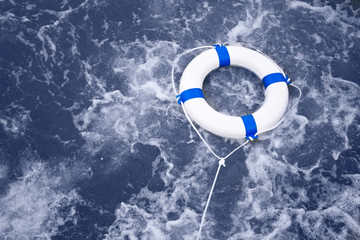 Lifebuoy, lifebelt, life saver rescue in a ocean storm full of f