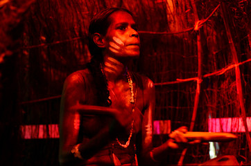 Fototapeta na wymiar Yirrganydji Aboriginal woman play Aboriginal music with Clapstic