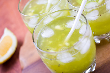 Drink from a kiwi and a lemon