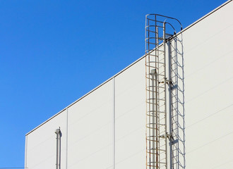 The staircase leading to the roof of a modern building. Stairs at the mall. Go up to the next level.