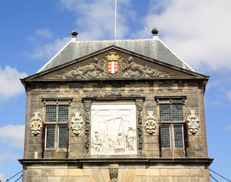 the facade of the Cheese and Craft Museum in De Waag from 1668 in the city of Gouda. The Netherlands