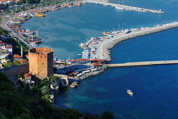 Fototapeta premium Aerial view of Red Tower (Kizil Kule) and port Alanya in Turkey