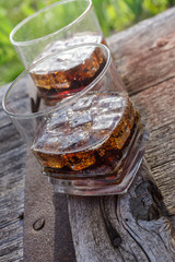 Two glasses of cola with ice