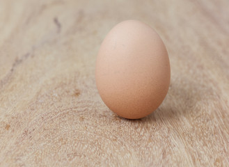 Egg on wooden table