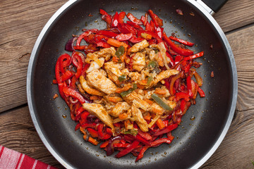 Fried chicken pieces with vegetables.