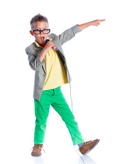 Boy singing with a microphone 