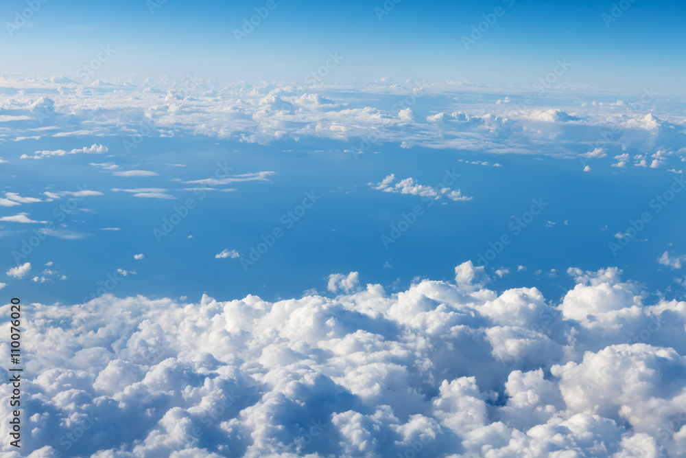 Wall mural blue sky with clouds. view from airplane
