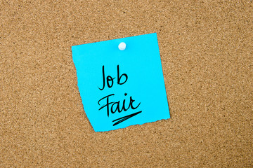 Job Fair written on blue paper note