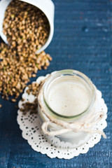 vegan fresh milk from hemp seeds in a glass jar, clean eating
