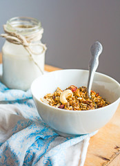 granola with cashews and banana with vegan milk, breakfast