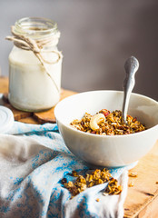 granola with cashews and banana with vegan milk, breakfast