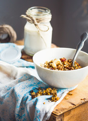 granola with cashews and banana with vegan milk, breakfast