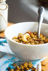 granola with cashews and banana with vegan milk, breakfast