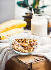 granola with cashews and banana, vegan milk, healthy breakfast
